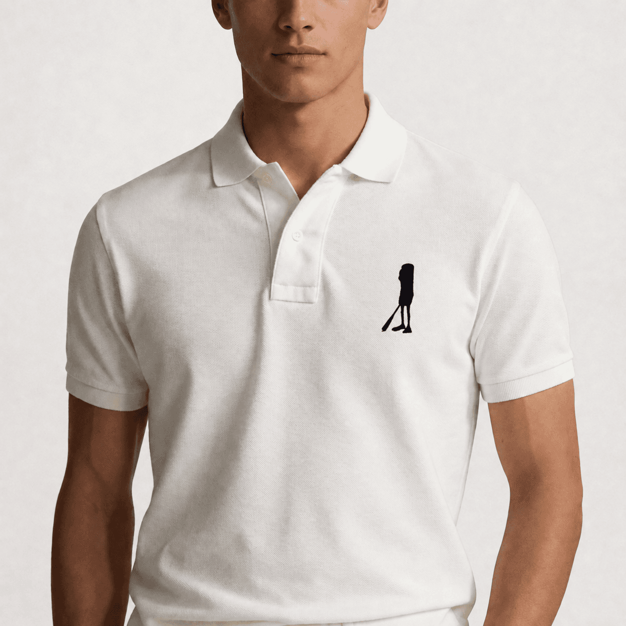 Detail shot of the Triple T-Shirts polo collar and emblem